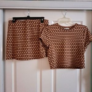 Crop top and skirt set from pink rose- size says large but can fit a medium.